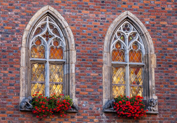 Mullioned windows with flower boxes; Town Hall, Wroclaw, Poland