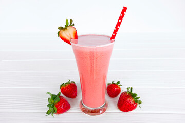 Strawberry yogurt fruit juice smoothie pink colorful fruit juice milkshake blend beverage healthy high protein the taste yummy In glass drink episode morning on white wood background.