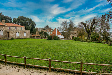 Obraz premium Beautiful Landscape Of A Green Meadow With A Small House And A Nice Blue Sky. 