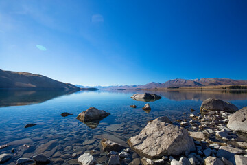Beautiful views over the shoreline of New Zealand's Lake Tekapo; Canterbury, New Zealand
