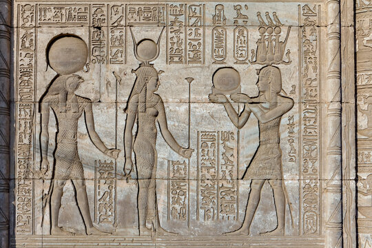 Bas-relief carvings of Horus and Hathor with Emperor Trajan at Mammisi, Birth House, Dendera, Egypt