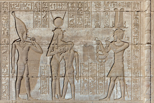Bas-relief of Emperor Trajan presenting an offering to Goddess Hathor at Birth House, Dendera, Egypt