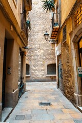 Narrow street in the Gothic quarter of Barcelona, ​​Spain