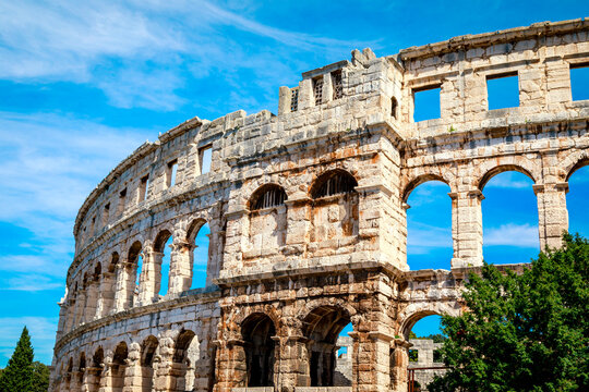 The Pula Arena, 1st Century, Roman Amphitheatre with a blue sky; Pula, Istria, Croatia