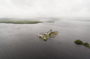 Aerial view of Station Island, a pilgrim site associated with St Patrick, located in Lough Derg; Ballymacavany, County Donegal, Ireland