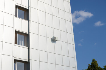 HVAC air conditioning and ventilation systems on wall. Outdoor Air conditioning unit mounted on...