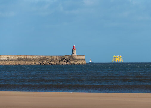 Tyne South Pier Lighthouse and leg turrets for windfarm windmill energy generation; South Shields, Tyne and Wear, England
