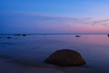Sunset over the Baltic Sea on the beach of Ostersomarken, Bornholm Island, Denmark, Scandinavia,...