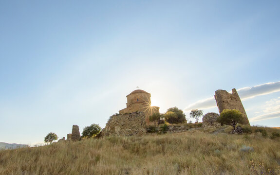 The sun sets over Jvari Monastery near Mtskheta, Georgia; Mtskheta, Georgia