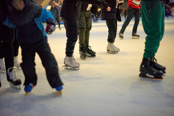 people ice skating.