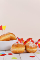 German traditional 'Berliner Pfannkuchen', a donut without hole filled with jam. Traditional served during carnival.