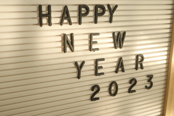 Letter board with the words Happy New Year 2023 greeting