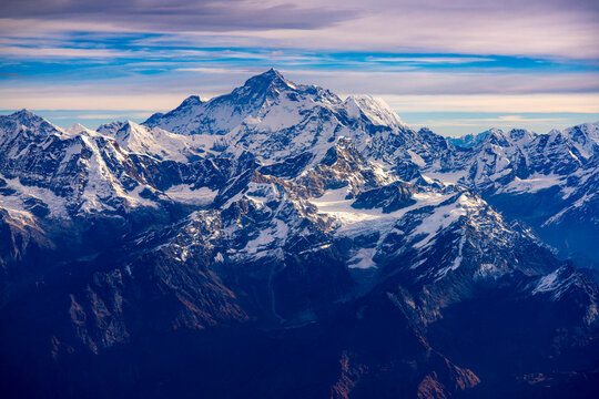 View of Mount Everest/Sagarmatha from a window on Dawn Kathmandu to Everest Flight over the Himalayas; Himalayas, Nepal