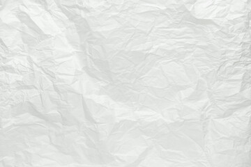 Obraz premium Crumpled white paper, top view.