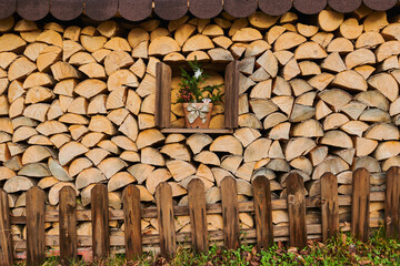 Decorated window in a wood pile at Mount Vapec, Klein Fatra, Carpathian Mountains; Horna Poruba, Slovakia