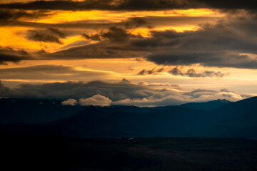 Cold winter sunset colors in Apuseni Mountains, Romania