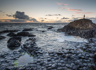 Sunset at the Giant's Causeway, a UNESCO world heritage site of some 40,000 hexagonal columns on the Antrim coast of Northern Ireland.