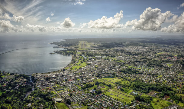 Aerial view from a helicopter of the city of Hilo overlooking Hilo Bay; Island of Hawaii, Hawaii, United States of America