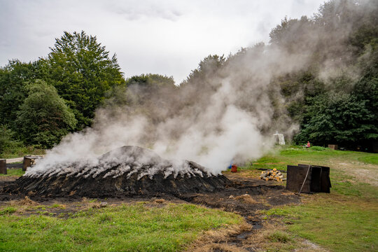 Charcoal makers burning mound; Transylvania, Romania