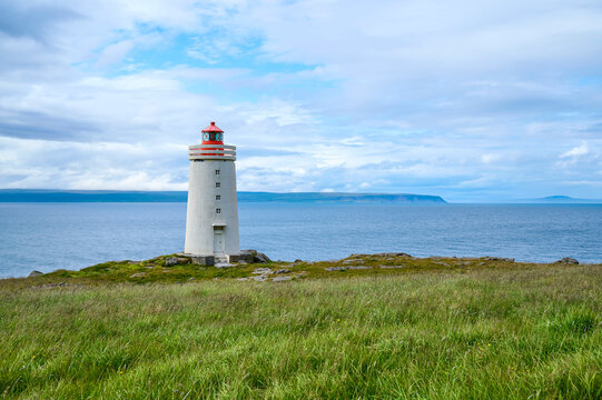 Lighthouse in summer, Phare de Skaro, on Vatnsnes Peninsula in Northern Iceland; Hvammstangi, Northern Region, Iceland