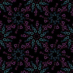 Seamless pattern of pink and blue hearts flowers on a dark background.Print with hearts in kaleidoscopic ornamental style.