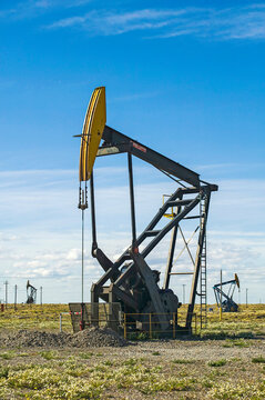 Oil rigs in landscape near the city of Comodoro Rivadavia, Patagonia, Argentina; Comodoro Rivadavia, Chubut, Argentina