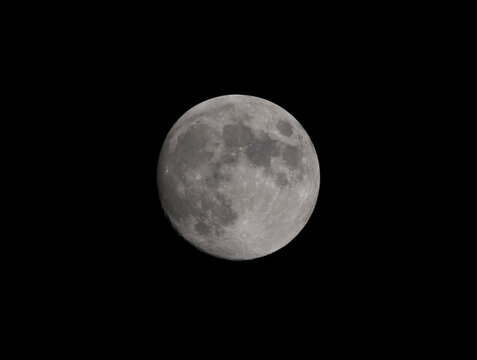 Moon just before Full, Waxing Gibbous with craters visible.
