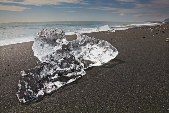 Ice on the coastal beach outslide the lagoon at Jokulsarlon, Iceland.; Jokulsarlon, Vatnajokull icecap, Iceland.
