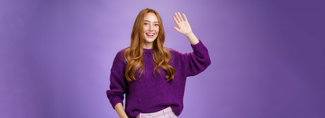 High five mate, hello. Portrait of friendly and excited charming kind redhead girl in sweater...