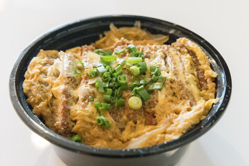 A Japanese Oyako donburi in a bowl