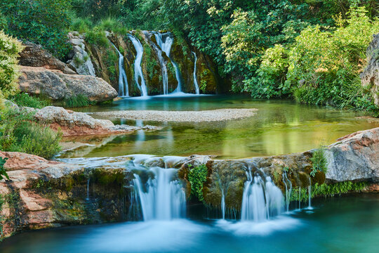 Scenic beauty of the cascading waterfalls at El Parrizal Beceite along the Matarranya River in the Province of Teruel, Autonomous Region of Aragon; Spain