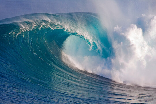 Perfect curl of a wave breaking at Peahi on Maui's North Shore; Maui, Hawaii, United States of America