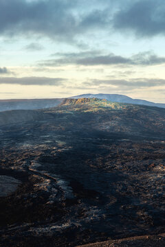 The Fagradalsfjall Volcano stands silent against the setting sun following a recent eruption; Iceland