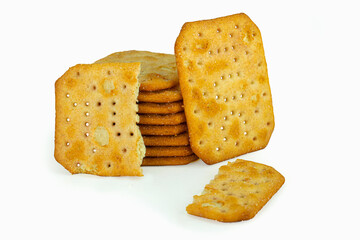 Broken and whole crackers isolated on white background, high quality details