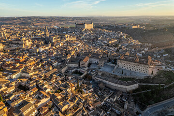 Aerial views of the city of Toledo during a sunrise on a clear and sunny day