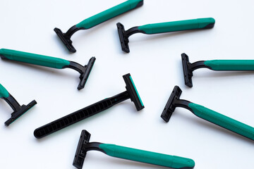 Men razors on blue background.