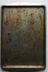 Top view of old stained cookie sheet, vintage cookie sheet, oxidized sheet pan