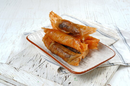 pisang coklat or piscok, is a sweet snack from Indonesia. It is made from sliced ​​bananas with chocolate, wrapped in lumpia spring roll . In the Philippines it is known as turon.