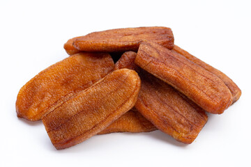 Sun dried bananas on white background.