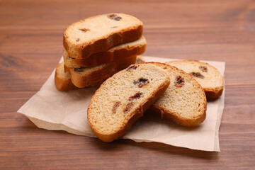 Sweet hard chuck crackers with raisins on wooden table