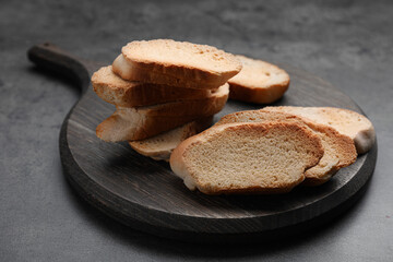 Tasty hard chuck crackers on grey table