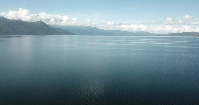 Flying calmly over Lake Yojoa, Honduras. Drone clip.