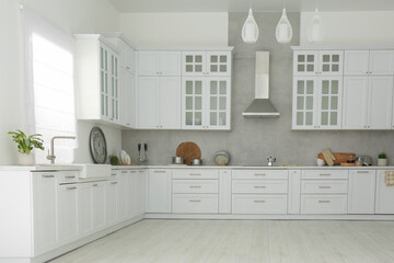 Beautiful kitchen interior with stylish modern furniture