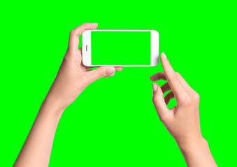 Young woman holding smartphone with green screen on color background, closeup. Mockup for design