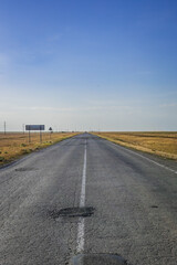 a road in the middle of the desert in kalmykia