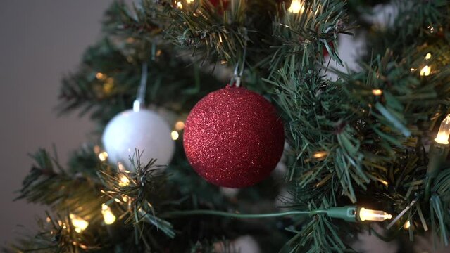 miscellaneous Christmas ornaments on a Christmas tree