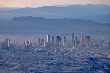 flying over city of los angeles at sunset