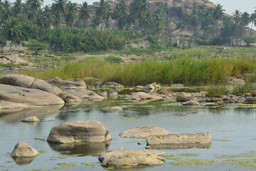 Landscape view of Vijayanagar Empire in Hampi, India. View of rocky hills along side Tungabhadra river..
