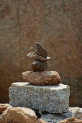Fototapeta na wymiar Stones are balanced on top of each other. Symbol of equilibrium and Zen