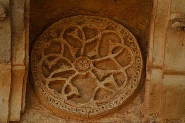 Fototapeta na wymiar Stone carving in temples of Hampi, India. A UNESCO World heritage site